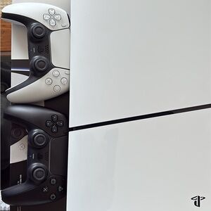 Sony PlayStation 5 Console with DualSense Controllers - White and Black